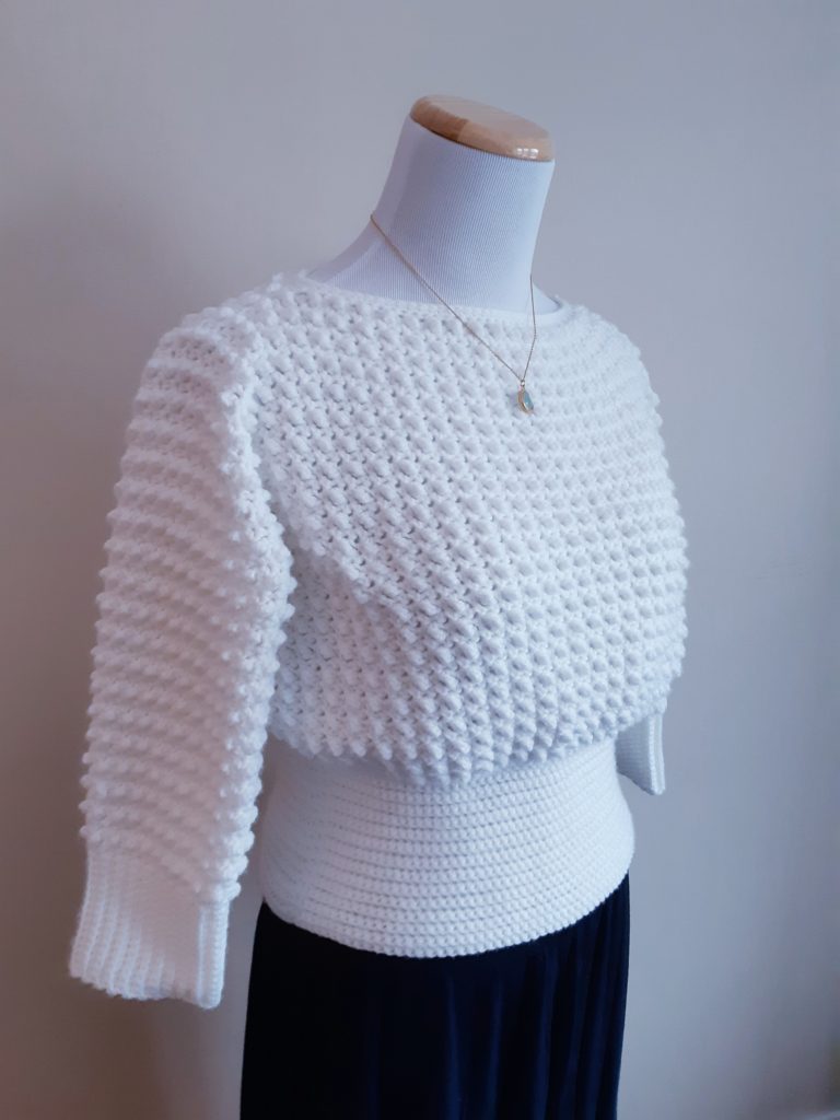white crochet sweater