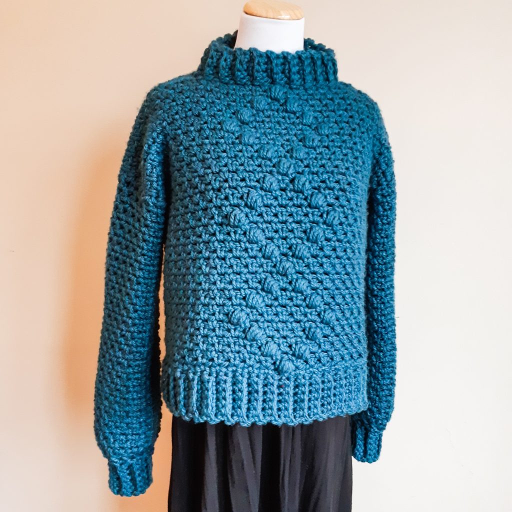 shorter length of chunky crochet pullover